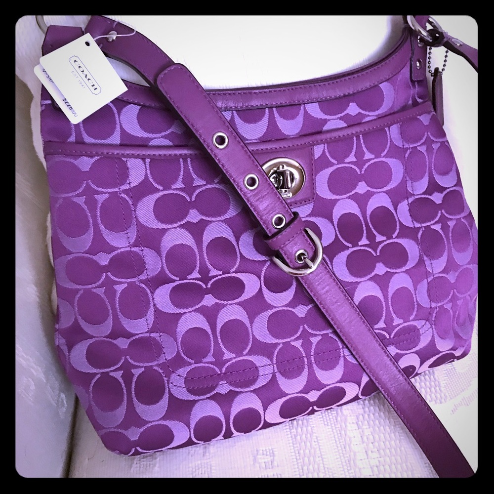 Coach F19259 signature sateen crossbody bag.